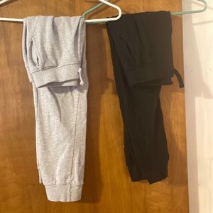 2 pair of sweatpants. Grey and black size 14.